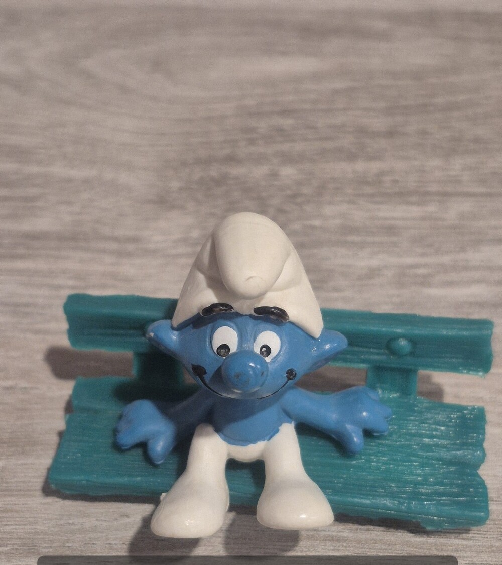 Vintage Sitting Smurf Figurine With Garden Bench